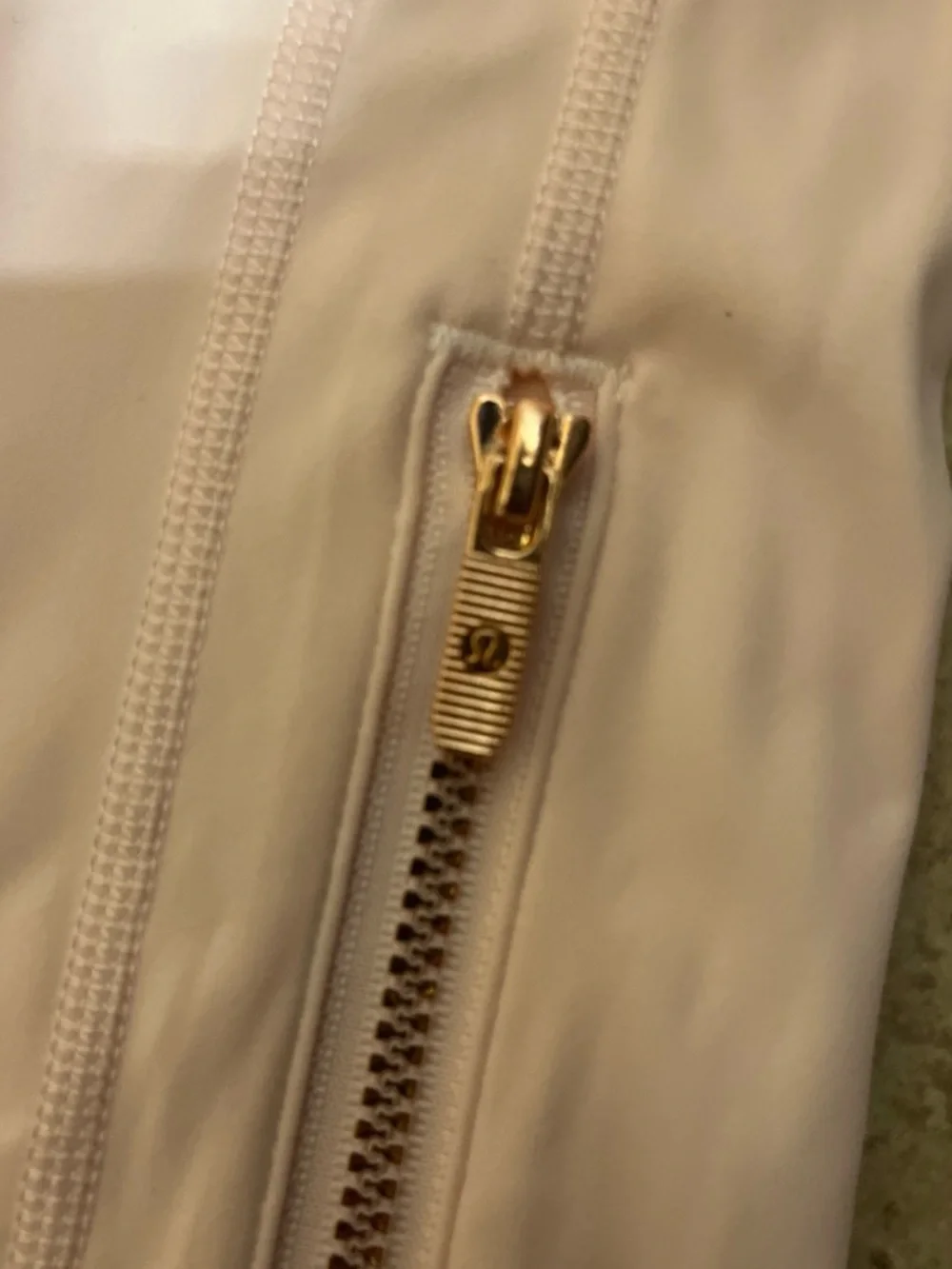lululemon athletica Women's Pink Full-Zip Jumpsuit with rose gold zipper.
